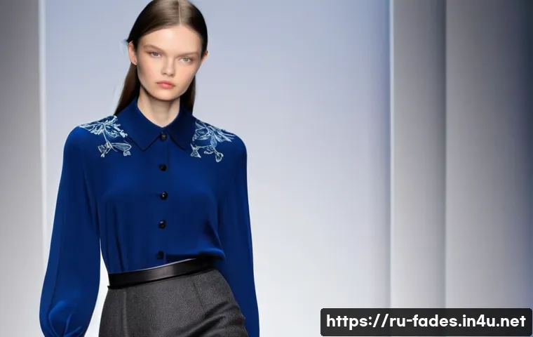 패션디자인과 패션프레젠테이션 - A high-fashion runway scene featuring a model wearing an elegant ensemble that highlights the interp...