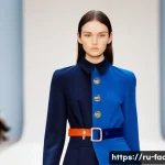 Home 22 패션 컬렉션 기획 - A high-fashion runway scene during Paris Fashion Week, showcasing models wearing eco-friendly and su...